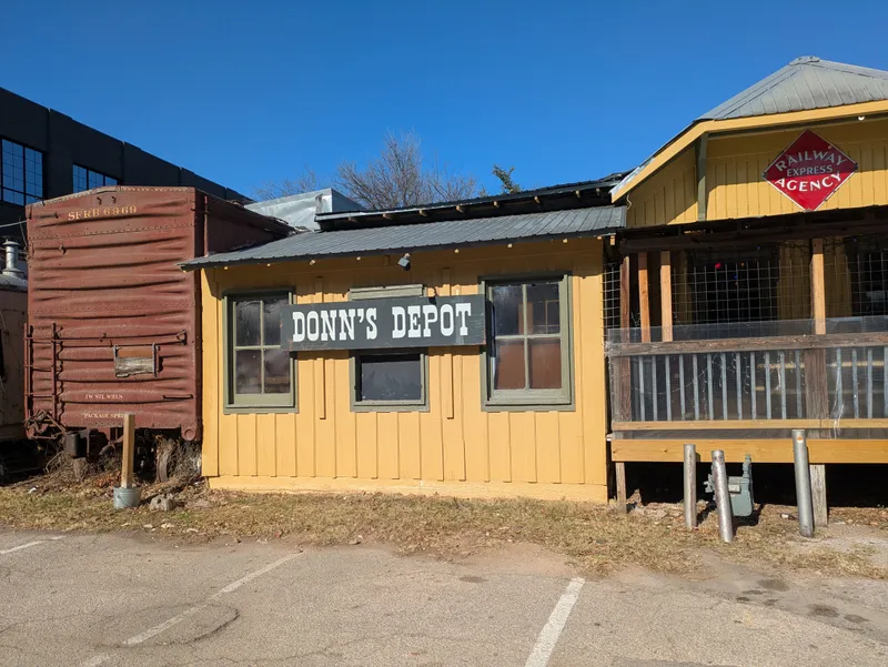 Donn's Depot restaurant with a vintage train car and Railway Express Agency sign.