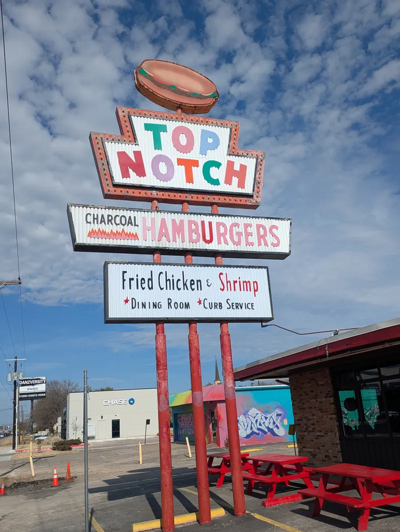 Top Notch Charcoal Hamburgers sign with a burger on top, advertising fried chicken and shrimp.