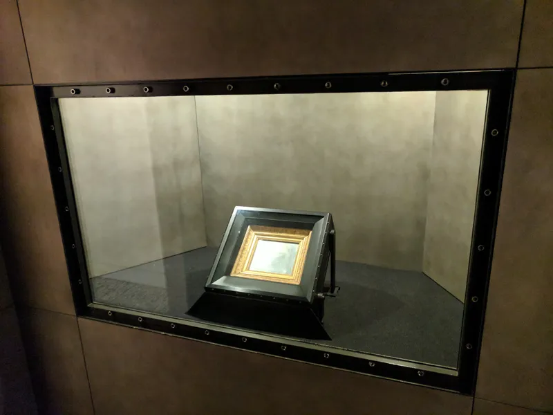 The first photograph, "View from the Window at Le Gras," displayed in a glass case.