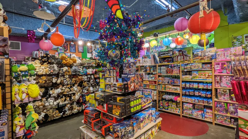 Interior of a colorful toy store filled with plush toys, action figures, and playsets.